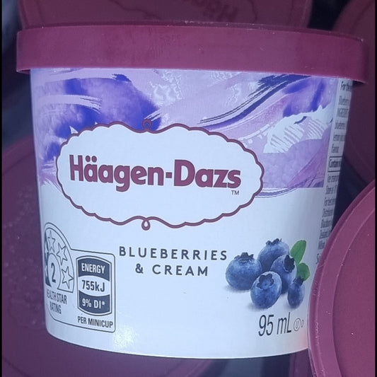 Häagen-Dazs blueberry & cream ice cream container on a white background