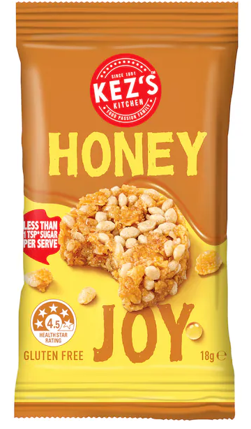 Packaging of Kez's Honey Joy snack with a brown and yellow design.