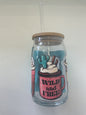 A 16oz clear glass tumbler with a bamboo lid and a glass straw, featuring a multi-color print with cacti and the text 'Wild and Free'.